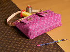 Louis Vuitton bag pink monogram canvas with front flap and adjustable shoulder strap