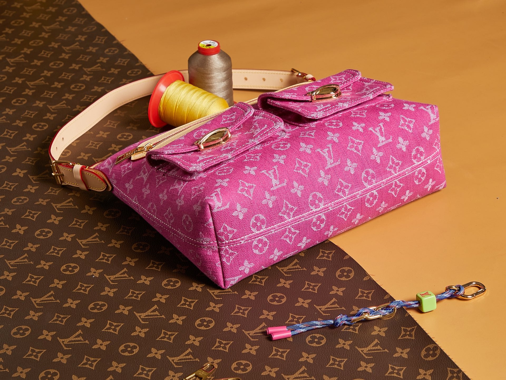 Louis Vuitton bag pink monogram canvas with front flap and adjustable shoulder strap