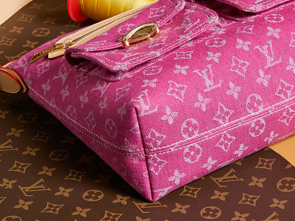 Louis Vuitton bag pink monogram canvas with front flap, gold hardware, and top zipper