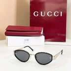 Sunglasses with black frame and smoke gray lenses
