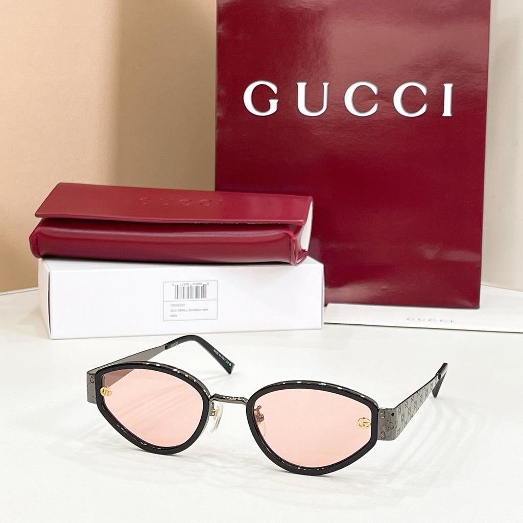 Sunglasses with black frame and pale pink lenses