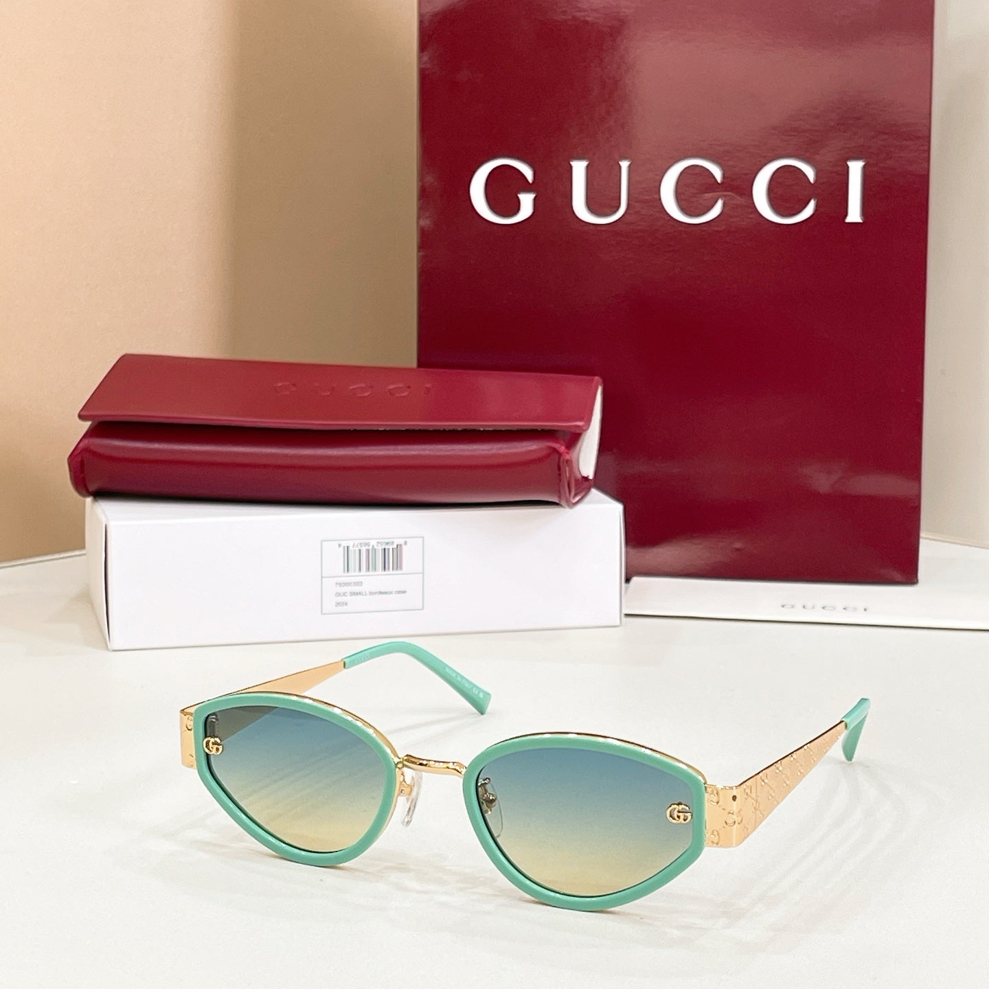Sunglasses with teal frame and light blue lenses