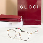 Rectangular eyeglasses with gold frame and green temple with red tip