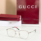 Rectangular eyeglasses with silver frame and green temple accents