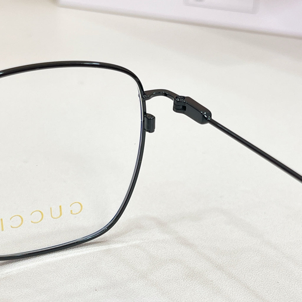 Black eyeglass temple with textured hinge and adjustable arm joint