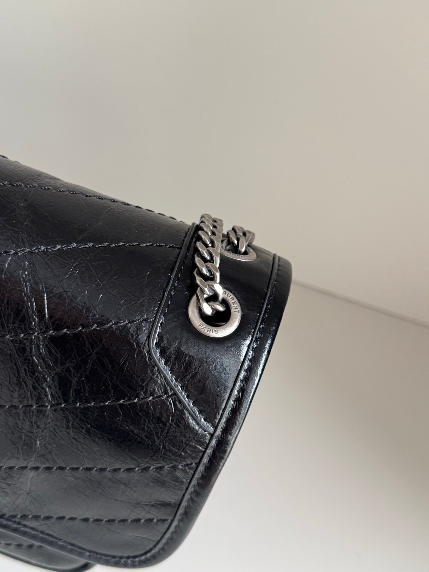 YSL dark leather shoulder bag corner clasp with linked chain and metal ring detail