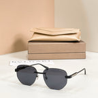 Metal aviator sunglasses, gold frame with black tinted lenses