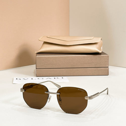 Metal aviator sunglasses, gold frame with brown tinted lenses
