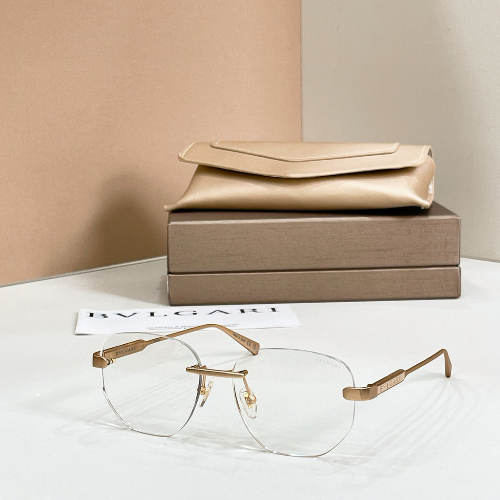 Clear eyeglasses, gold metal frame with clear round lenses