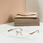 Clear eyeglasses, gold metal frame with clear round lenses