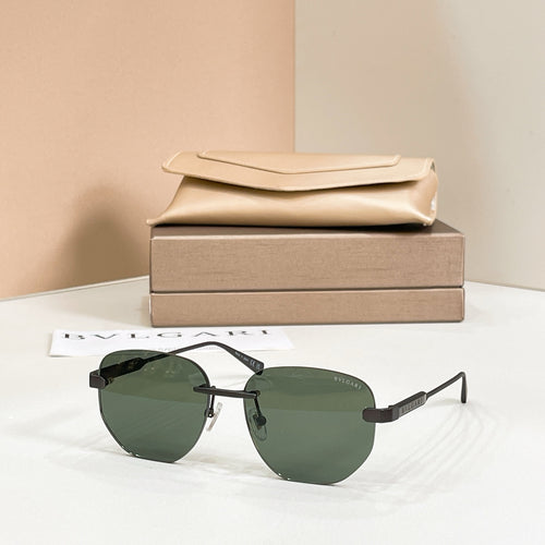 Metal aviator sunglasses, gold frame with dark green tinted lenses
