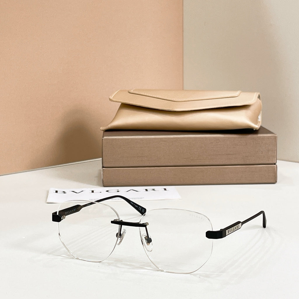 Clear eyeglasses, gold metal frame with round aviator lenses