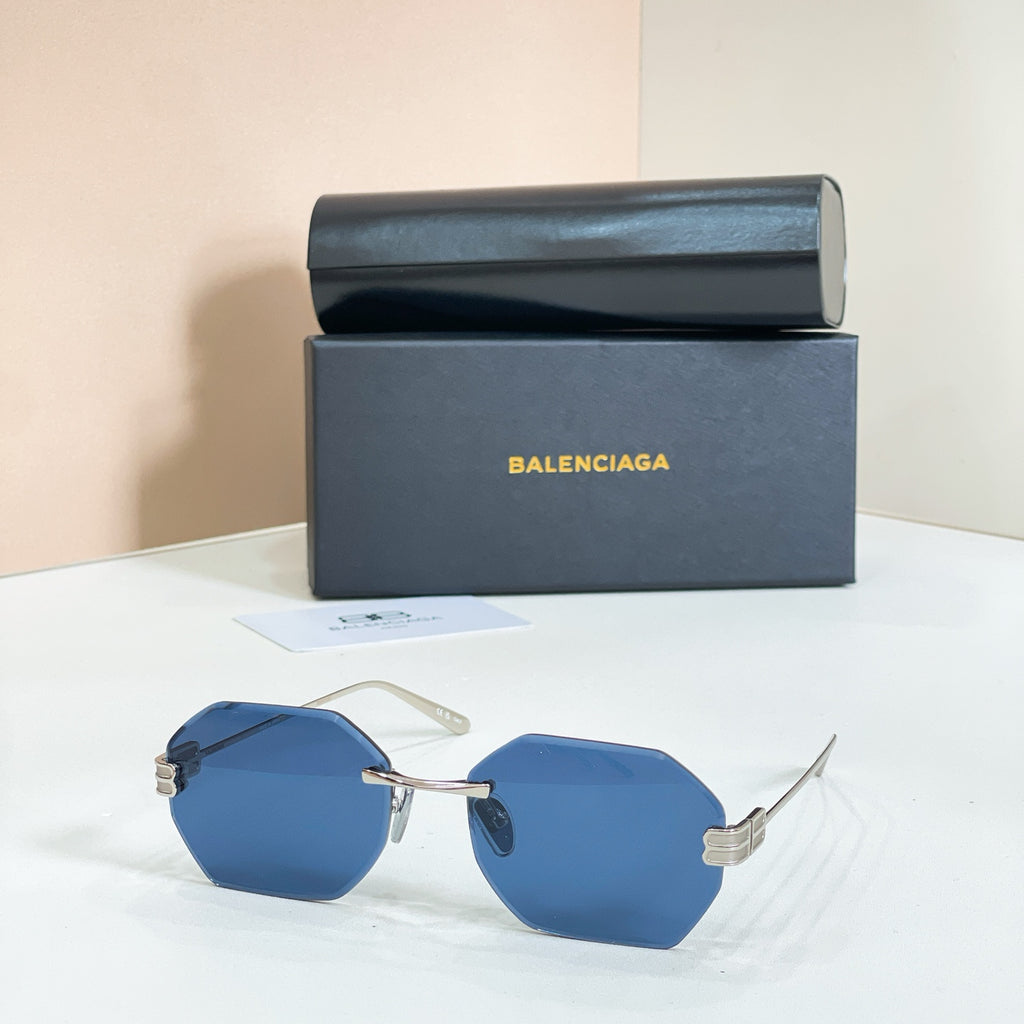 Octagonal sunglasses with silver frame and blue lenses
