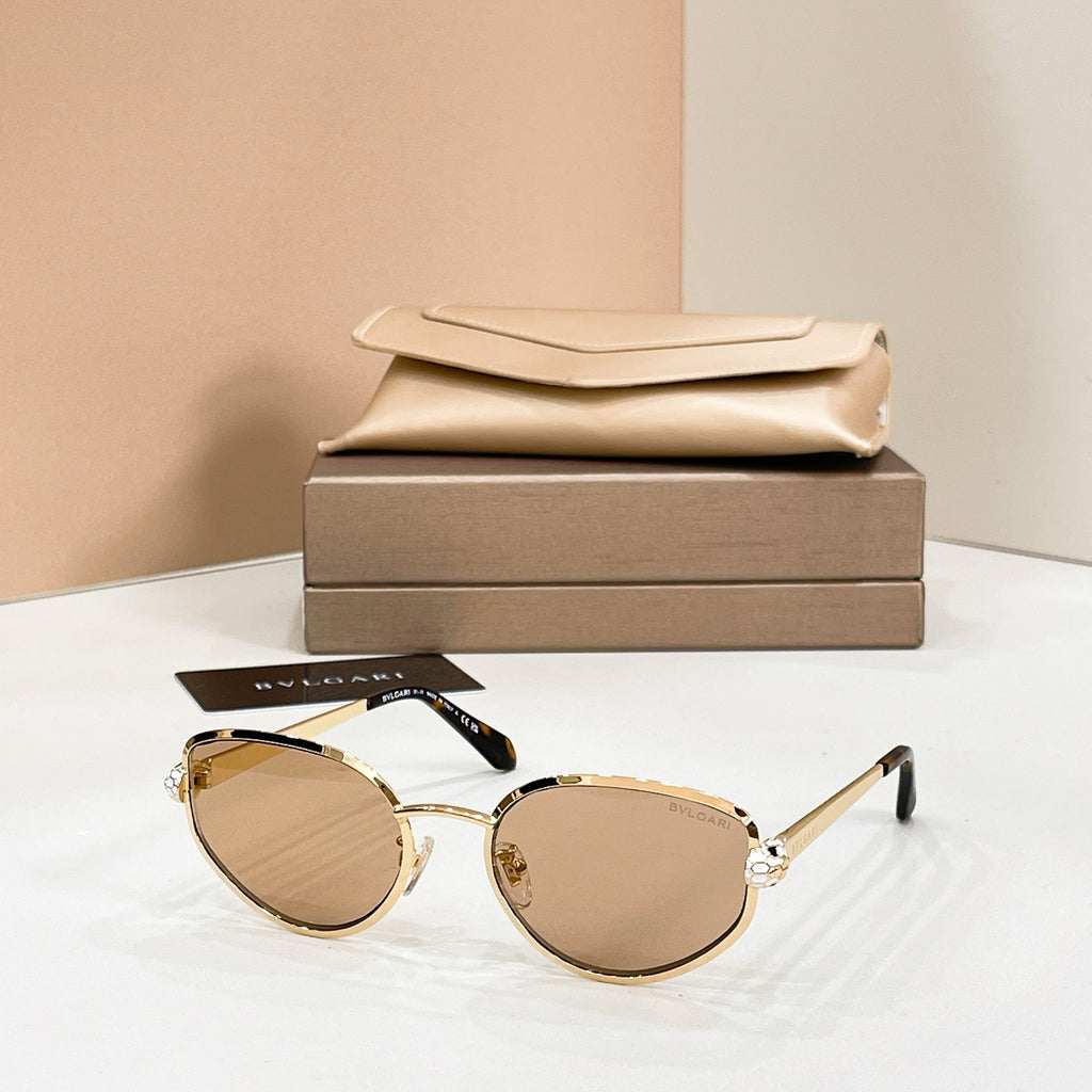 Bvlgari cat-eye sunglasses with brown-tinted lenses and gold-tone frame