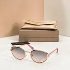 Bvlgari cat-eye sunglasses with pale gray lenses and rose-gold frame