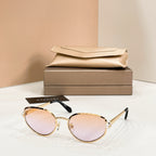 Bvlgari cat-eye sunglasses with light pink lenses and gold-tone frame