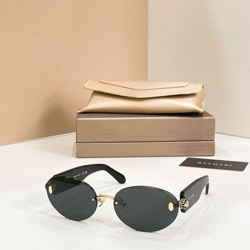 Bvlgari sunglasses with black metal frame and dark tinted round lenses