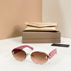 Bvlgari sunglasses with burgundy frame and pink-brown tinted round lenses