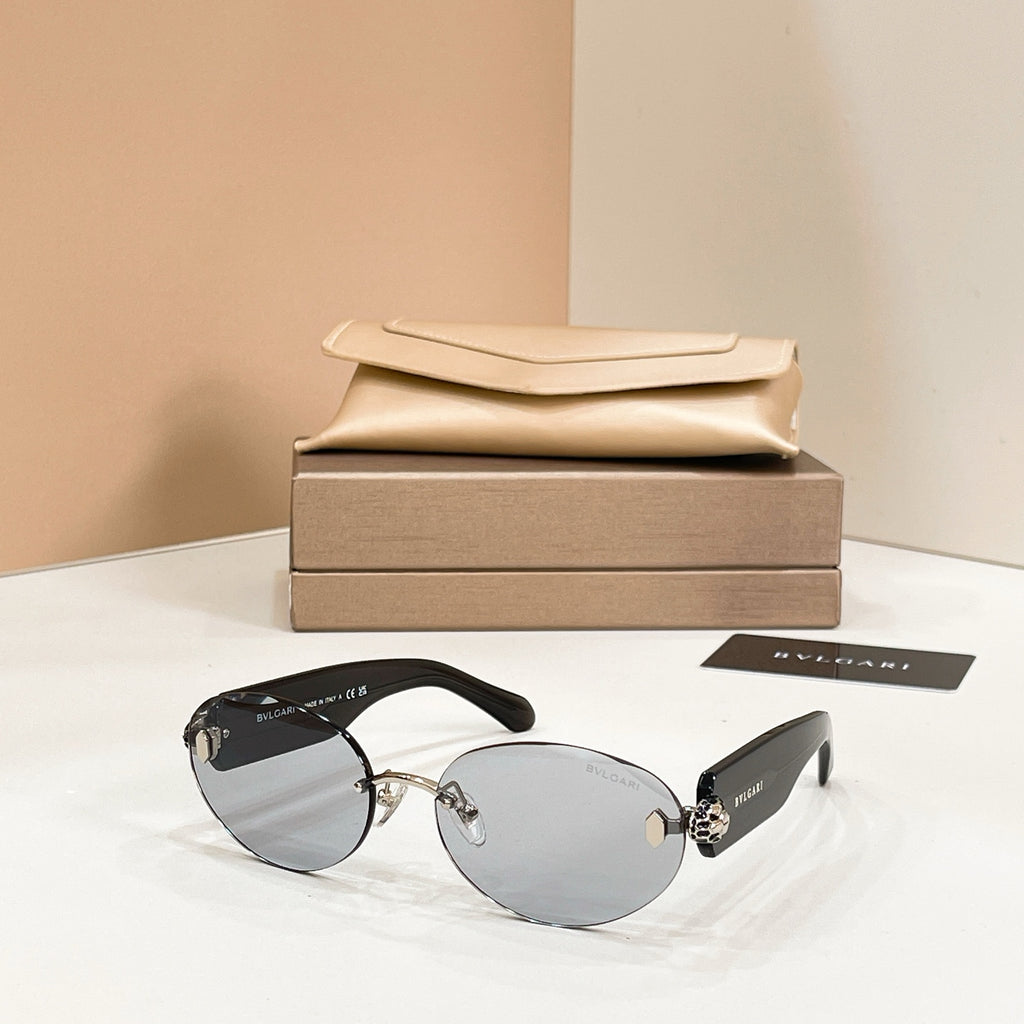 Bvlgari sunglasses with black frame and gray tinted round lenses
