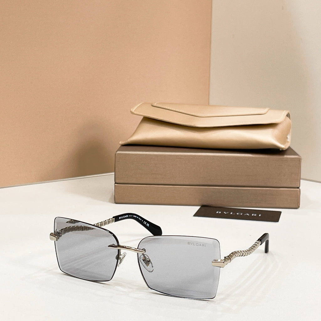 Bvlgari square sunglasses with gray frames and metal chain temples