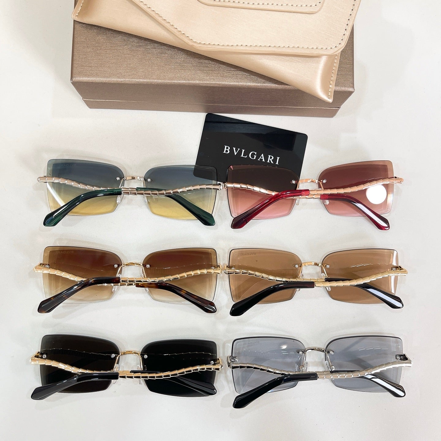 Assorted Bvlgari eyeglasses with mixed frames and tinted lenses, shown together