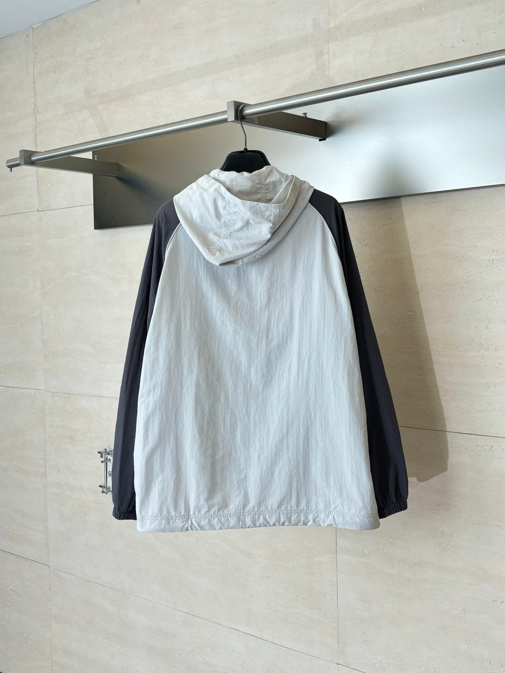 Balenciaga long jacket, white hooded windbreaker with dark side panels