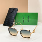 Bottega Veneta sunglasses with gold frame and light brown tinted square lenses