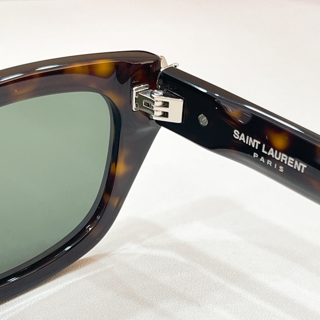 SAINT LAURENT temple arm on tortoiseshell cat-eye sunglasses with metal hinge