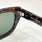 SAINT LAURENT temple arm on tortoiseshell cat-eye sunglasses with metal hinge