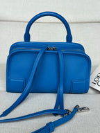 Loewe blue leather top-handle bag with front flap, zipper, and crossbody strap
