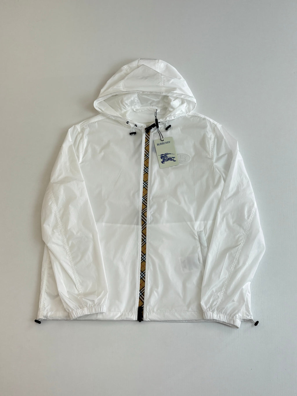 Burberry white hooded zip jacket with blue logo patch on chest