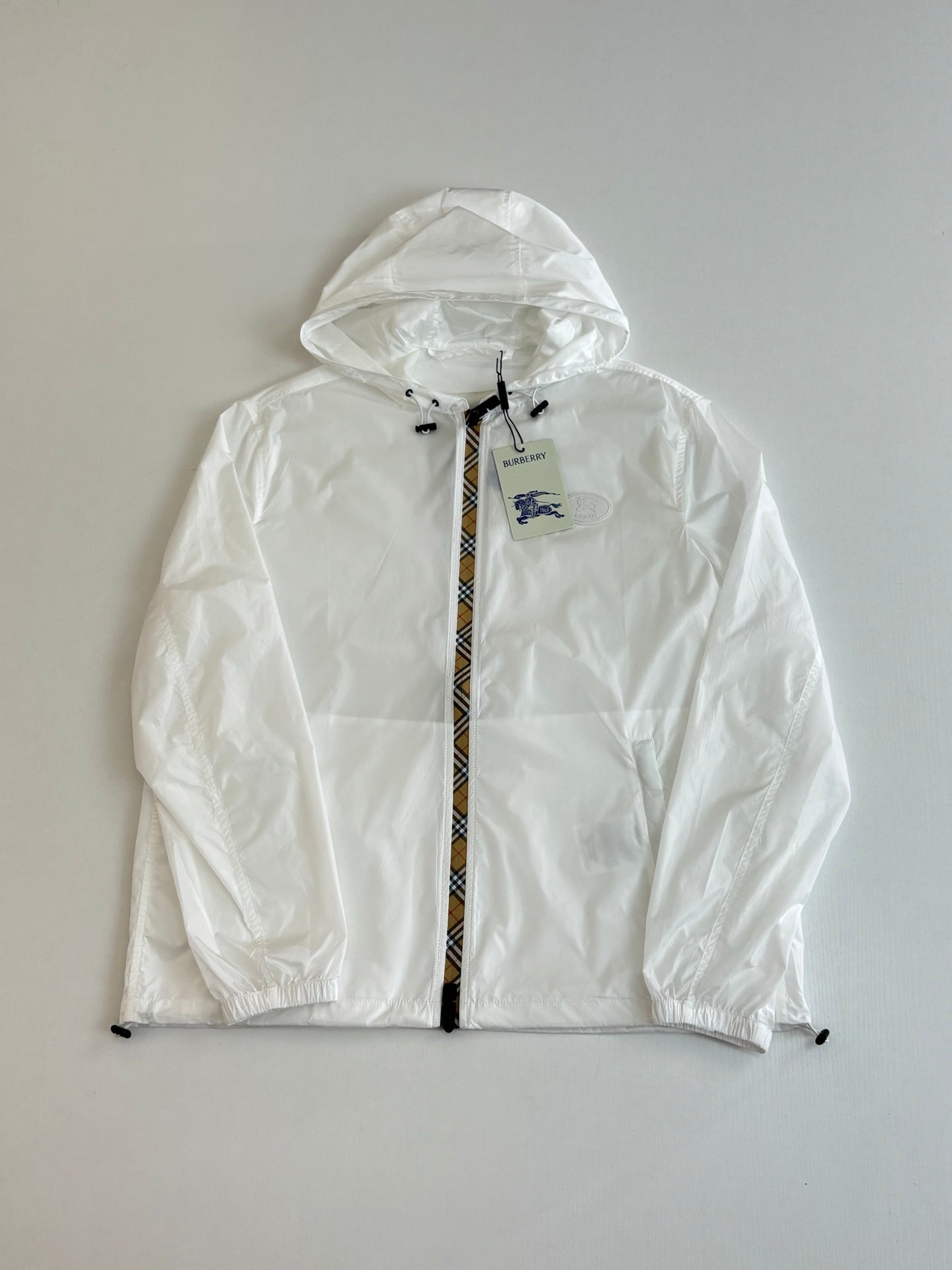 Burberry white hooded zip jacket with blue logo patch on chest