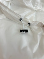 Burberry white windbreaker hood with black drawcords and toggle ends