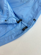 Burberry light blue long jacket with drawstring toggles at the hem