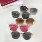 Assorted sunglasses with black, brown, and pink tinted lenses and gold frames