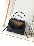 Loewe black leather top-handle bag with rounded silhouette and two handles