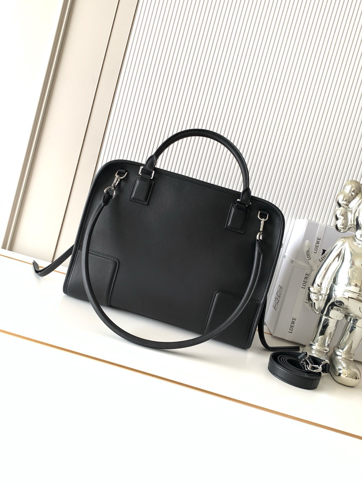 Loewe black structured tote bag with top handles and silver-tone hardware