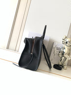 Loewe dark leather bucket-style bag with short handles and long crossbody strap