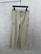 Light olive cargo pants with drawstring waist and button closure