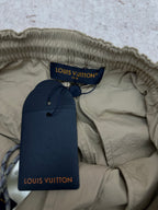Louis Vuitton interior waistband of light olive drawstring pants