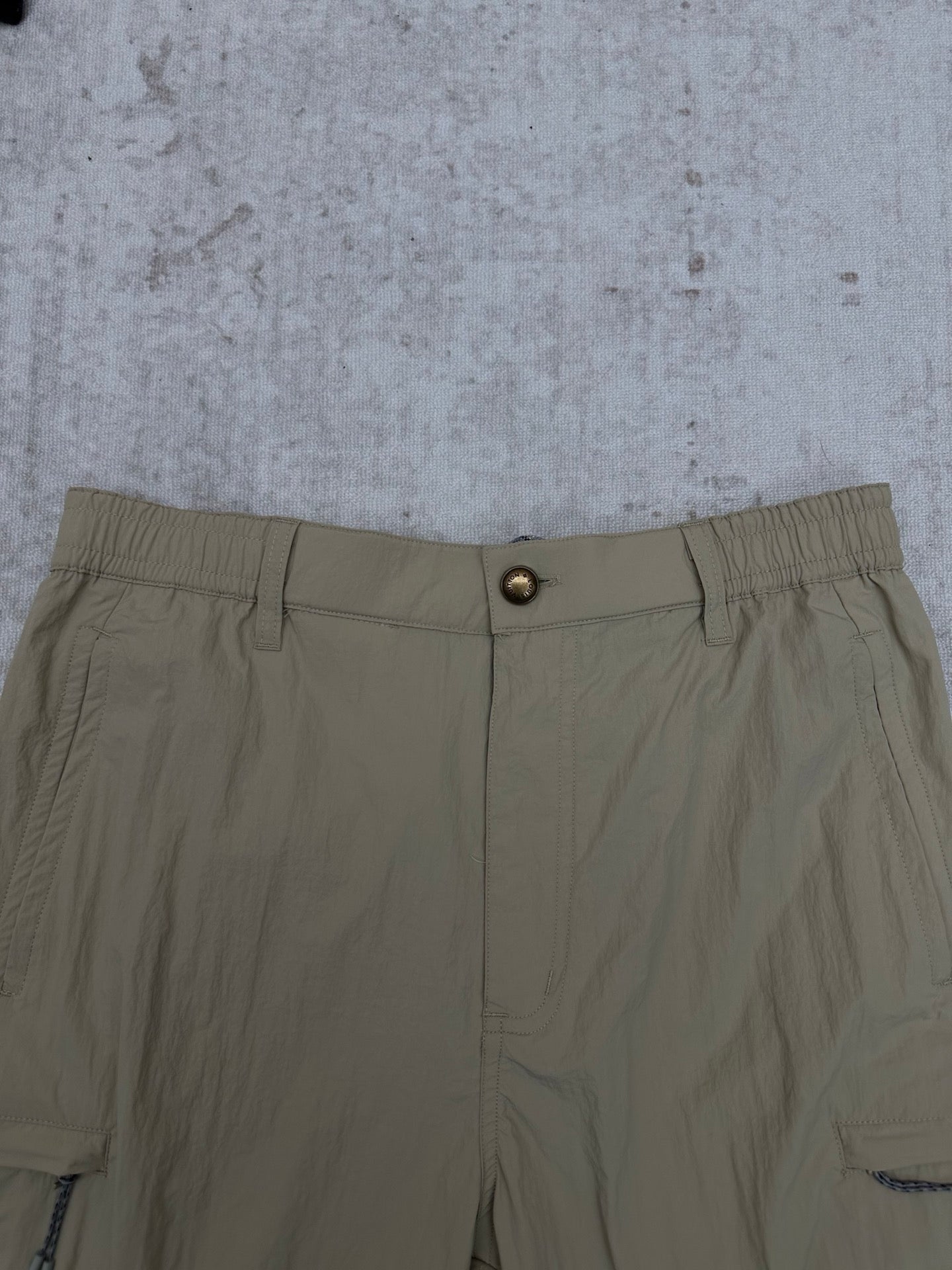 Light olive pants waistband with button and belt loops