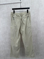 Light olive cargo pants with elastic waistband and side pockets