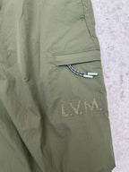 Olive green Louis Vuitton pants with side welt pocket and embroidered logo detail