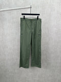 Olive green Louis Vuitton pants, front view with belt loops and button closure