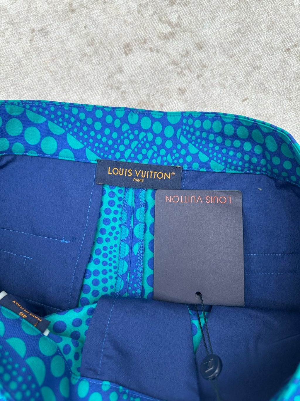 Blue patterned shorts with Louis Vuitton interior label and elastic waistband