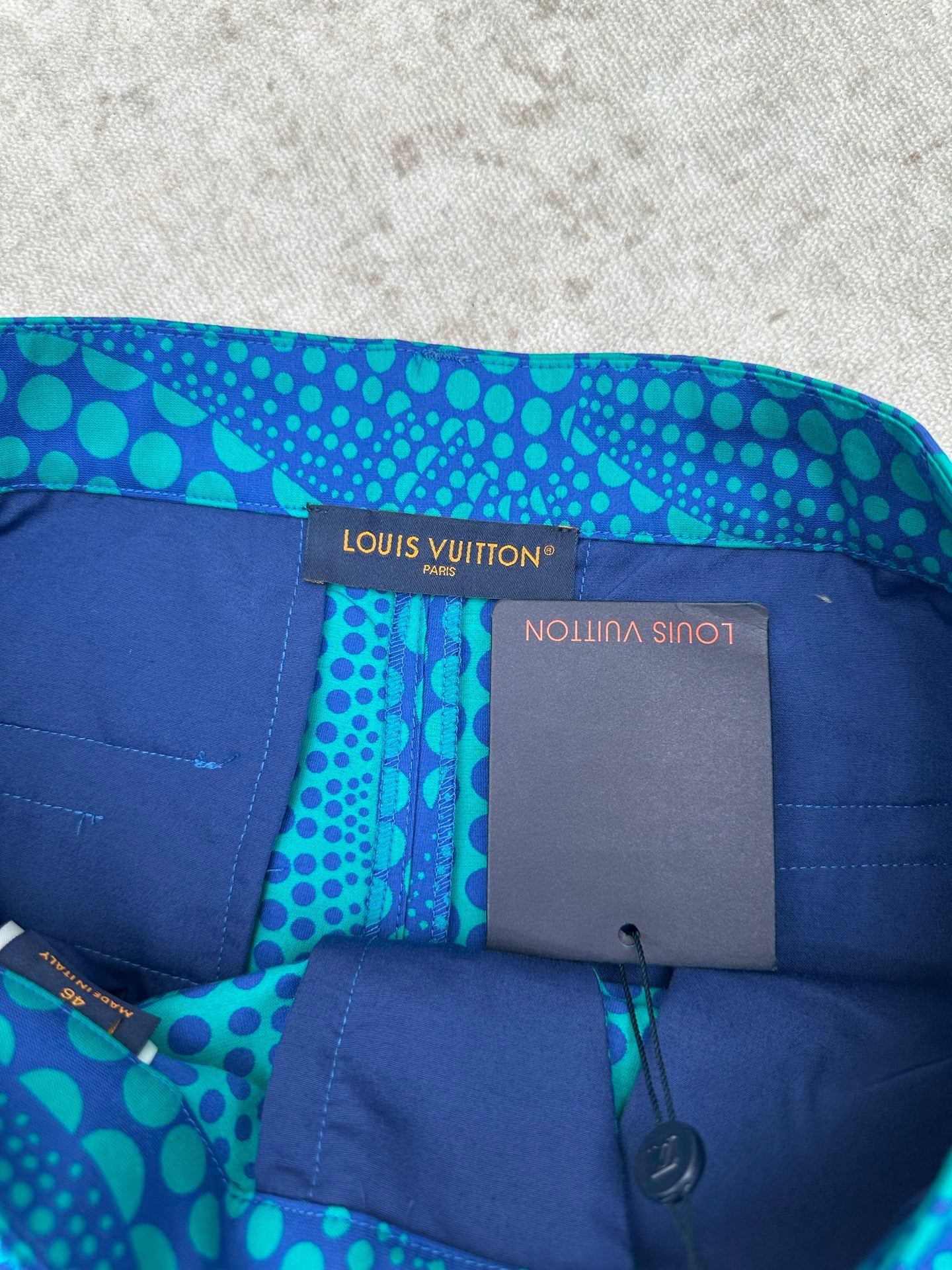 Blue patterned shorts with Louis Vuitton interior label and elastic waistband