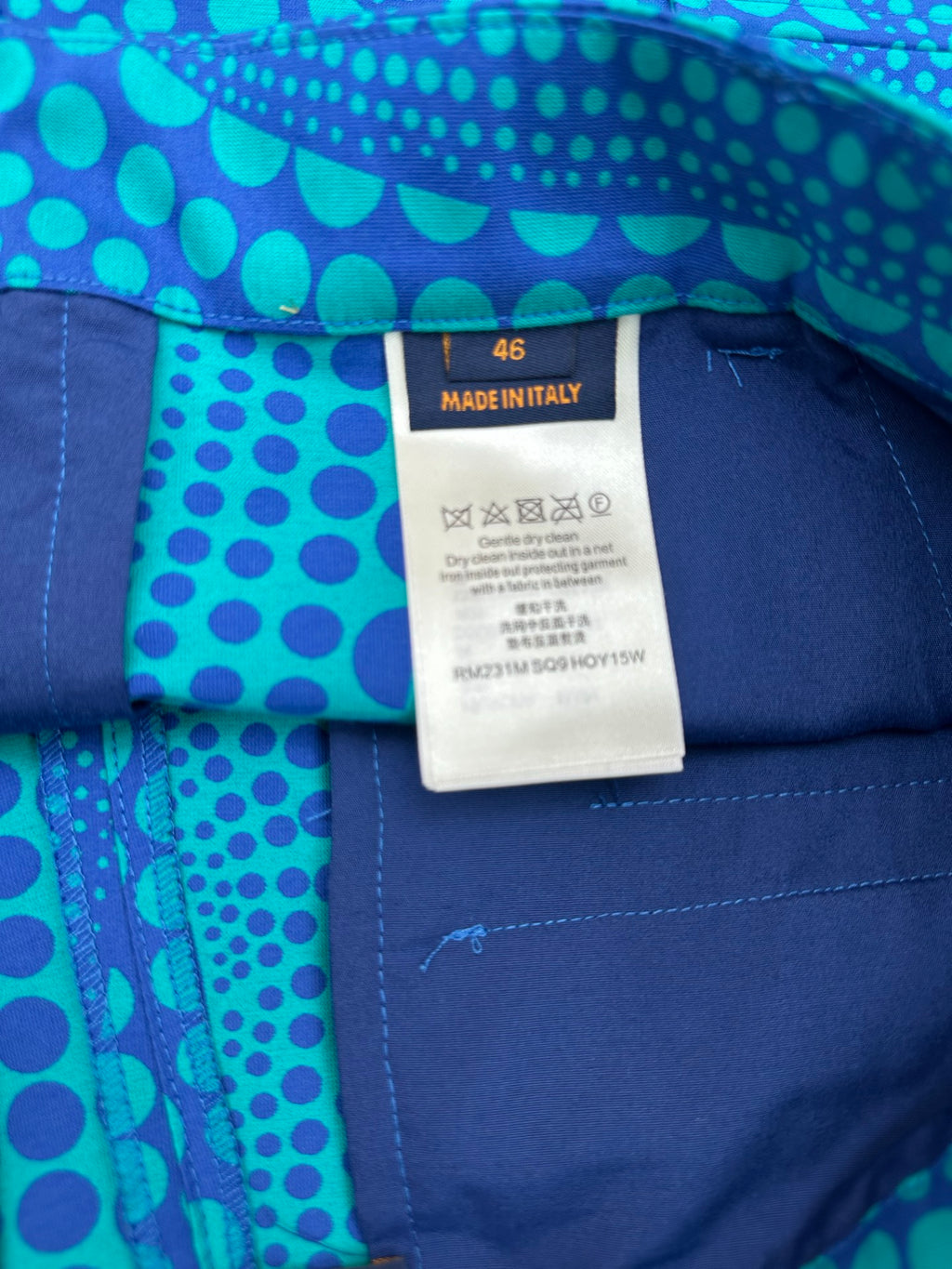 Blue patterned shorts with size 46 tag reading “Made in Italy”