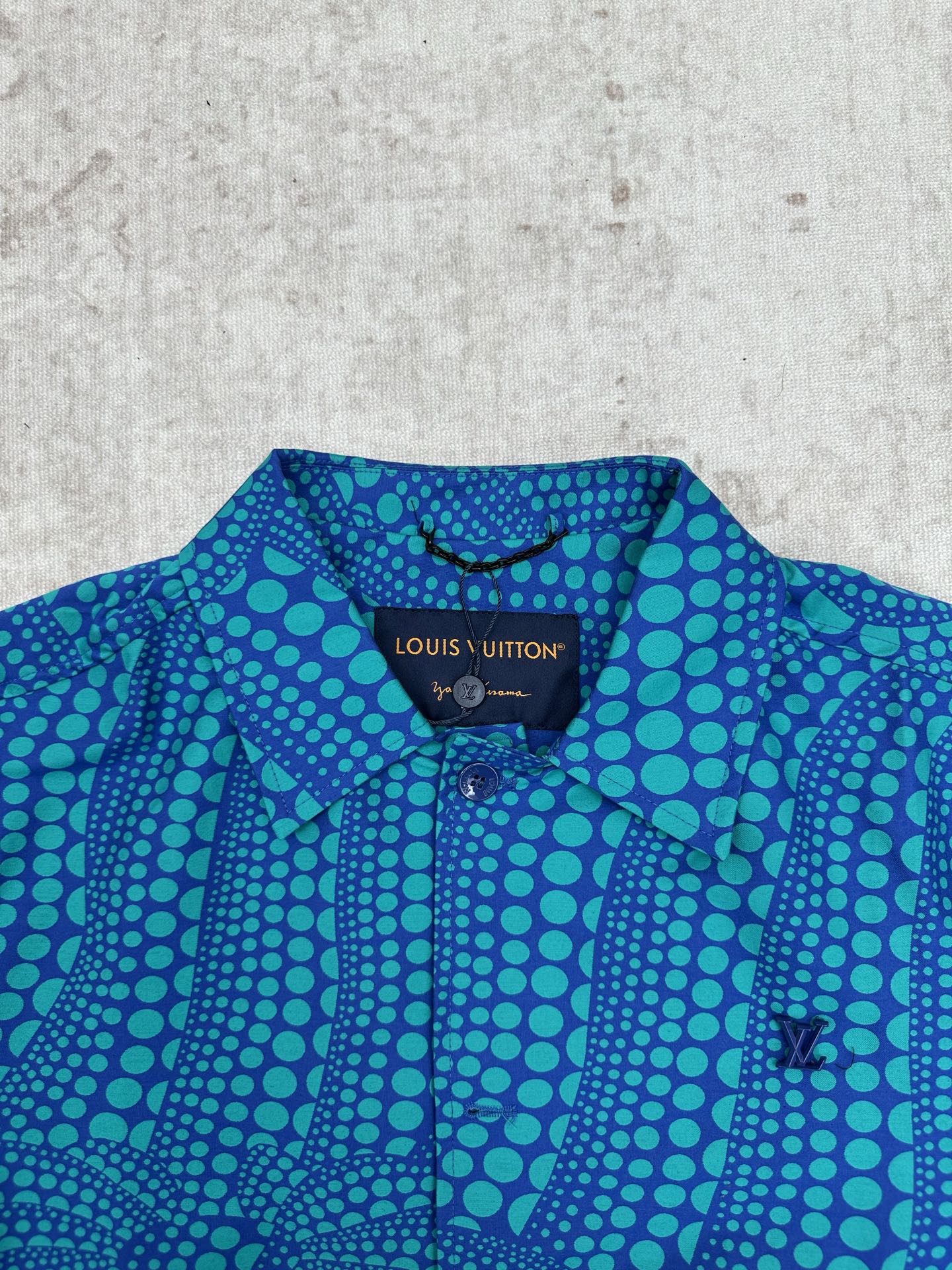 Louis Vuitton blue long-sleeve button-up shirt with teal dot pattern and collar