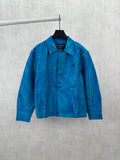 Blue long-sleeve button-up shirt with teal dot pattern and pointed collar