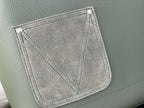 Louis Vuitton leather backpack front pocket panel with stitched trim, sage green.